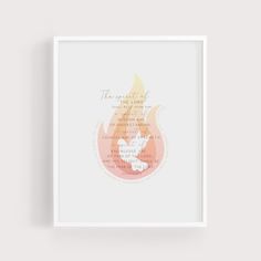 a white framed print with an orange and yellow flame