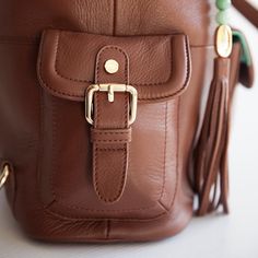 “Just got mine today. I gasped and squealed at the glory of it. So gorgeous!” The Meggan converts to backpack or messenger carry in just seconds! Designed by our co-founder to carry it all, this bag now stands up on her own. Lovingly crafted from our stunning natural tanned leather, and with our signature jade lining. You won’t find this attention to detail and quality for less. *Each batch or shipment of naturally tanned leather may vary in shade. Colors: Premium full grain leather in a rich br Leather Diaper Bag Backpack, Lily Jade, Stroller Straps, Work Tote, Blush And Gold, Diaper Bag Backpack, Navy Gold, The Glory, Leather Messenger Bag