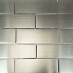 a close up view of a metal tile wall