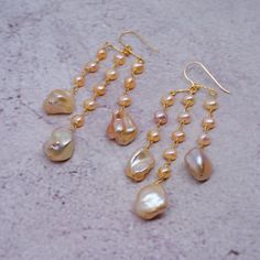 Gold High Luster Dangle Pearl Earrings, High Luster Gold Dangle Pearl Earrings, Gold Dangle Pearl Earrings With High Luster, High Luster Baroque Pearl Dangle Earrings, Gold Briolette Pearl Earrings For Wedding, Handmade Pearl Earrings For Anniversary, Handmade Baroque Pearl Earrings For Anniversary, Wedding Earrings With High Luster Baroque Pearls, Wedding Baroque Pearl Earrings With High Luster