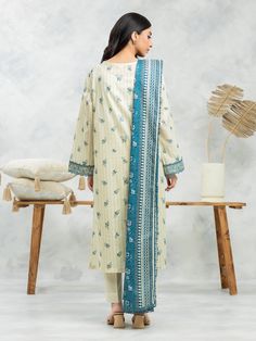 Brand: edenrobe Product: EWU24A1-29471-3PCollection: Allure Lawn Unstitched - Spring Summer CollectionFabric: Lawn DESIGN DETAILS: 3M Printed Lawn Shirt 2.5M Printed Lawn Dupatta 1.8M Dyed Trouser DISCLAIMER:* Lining, Laces, and Tassels are not included in unstitched variants.* Embellishment items in stitched outfits are subject to market availability.* The actual colors of the outfit may vary from the colors being displayed on your device. CARE INSTRUCTIONS: Extra Fabric Has Been Used For Shoot Original Color May Vary Slightly From The Picture Dry Clean Recommended Iron The Clothes At Moderate Temperature Do Not Use Bleach, Or Stain Removing Chemicals Damp Fabric Should Not Be Exposed To Sunlight edenrobe Allure Lawn Spring Summer Collection Authenticity Guaranteed – 100% Original Brand 3 Elegant Cream Cotton Palazzo Set, Unstitched Cream Kurta With Printed Motifs, Designer Cream Sets With Printed Motifs, Elegant Fitted Suits With Printed Motifs, Elegant Suits With Printed Motifs For Eid, Designer Cream Salwar Kameez With Printed Motifs, Cream Salwar Kameez With Printed Motifs For Wedding, Elegant Cotton Suit For Eid, Wedding Salwar Kameez With Printed Motifs In Cream