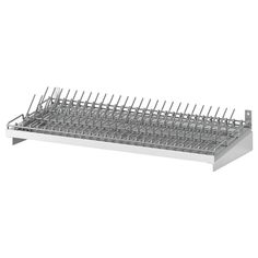 a stainless steel dish rack on a white background