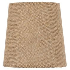 a beige lamp shade on a white background