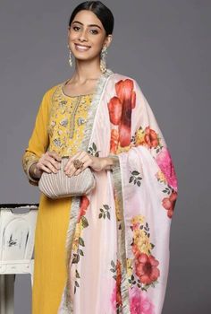 "Product Details Yellow embroidered Kurta with Trousers with dupatta Kurta design: Ethnic motifs embroidered * Straight shape * Regular style * Round neck, three-quarter regular sleeves * Thread work detail Calf length with straight hem * Art Silk blend  fabric Trousers design:  * Solid Trousers * Elasticated waistband * Slip-on closure Size & Fit Size worn by the model:S Waist: 28\" Chest: 32\" Hips: 33\" Height: 5'7\" Material & Care Top Fabric-Silk Blend Bottom- ArtSilk Blend Dupatta- ArtSilk Blend Dry Clean Items includes One piece Kurta One piece Trouser One piece Dupatta Note:- Please see the size chart in the image to choose a perfect size. Please feel free to ask any questions regarding this item WE ALSO ACCEPT CUSTOMISATION AS PER CUSTOMER REQUESTS." Yellow Chanderi Dupatta With Woven Motifs, Yellow Semi-stitched Raw Silk Dupatta, Red Semi-stitched Dupatta With Floral Print, Yellow Semi-stitched Dupatta With Printed Border, Yellow Embroidered Cotton Dupatta, Ethnic Motifs, Kurta Design, Fabric Silk, Kurta Designs