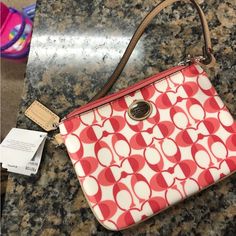 Adorable Coach Wristlet Retails For $58.00 White Coach Clutch With Zipper Pouch, Red Trendy Wristlet For Everyday Use, Trendy Red Wristlet For Everyday Use, Chic White Wristlet For Everyday Use, Coach White Rectangular Wristlet, White Rectangular Coach Wristlet, White Wristlet With Removable Pouch, White Wristlet With Zipper Closure, Trendy White Pouch Wristlet