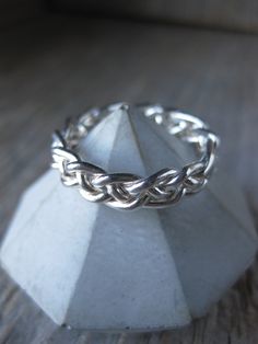 Multi BRAID Polished sterling silver ring Either 4 or 5 strands braided in wax, then cast directly into sterling silver using the lost wax process. Simple yet intricate, I have one of these on my right thumb 24/7. Each one of these is unique, as they are made from scratch just for you. SEE DROP DOWN MENU FOR AVAILABLE SIZES. READY TO SHIP 3.5 mm wide braid ring will have one visible seam. See trio braid rings here: https://etsy.me/2Eby3gA Handmade in NY thanks for looking 5 Strand Braids, Braid Rings, Strand Braid, Braided Ring, Made From Scratch, Lost Wax, Ring Sterling Silver, Sterling Ring, Sterling Silver Ring