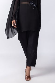 Black overlay top with floral embroidery highlighted with bead work. Paired with a crop top and pant. - Aza Fashions Elegant Bottoms With Dupatta For Eid, Elegant Bottoms With Mirror Work For Festive Occasions, Elegant Festive Pants With Sheer Dupatta, Elegant Festive Bottoms With Mirror Work, Elegant Silk Bottoms With Resham Embroidery, Elegant Designer Wear Bottoms, Elegant Embroidered Bottoms For Designer Wear, Elegant Silk Pant Set With Sheer Dupatta, Elegant Silk Bottoms For Eid