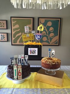 two cakes sitting on top of a table covered in yellow and brown frosting next to each other