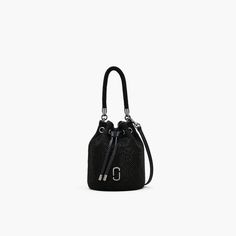 An eye-catching bucket bag with signature J Marc hardware and showstopping rhinestone exterior. This covetable mini bag features a drawstring pull-closure and rhinestone-adorned top handle with polished metal detailing. Carry by top handle, or attach adjustable leather strap to style as a crossbody. | MARC JACOBS The Rhinestone Mini Bucket Bag in Black Mini Bucket Bag, Mini Bucket Bags, Mini Bucket, Mini Bag, Marc Jacobs, Bucket Bag, Top Handle, Leather Straps, Exterior