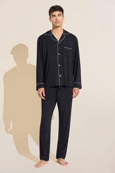 Give him a good night’s sleep, every night. Inspired by our best-selling women’s pajamas, but made just for him, our men’s PJ’s are cut from the same luxuriously soft and sustainable TENCEL™ Modal fabric. They’re designed to be breathable, long lasting and machine washable. He’ll turn to this classic set daily to look and feel polished while at the same time comfortable, whether he’s at home or away. Our men’s pajamas make for a gift he’ll love, and match back to our women’s Gisele PJ’s for a hi Mens Night Wear, Men’s Pajamas, Sleep Wear Men, Robes Men, Mens Silk Pajamas, Pajamas Men, Nightwear Outfits, Eberjey Pajamas, Men Pajamas