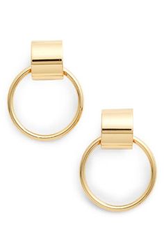 Why just reach for the brass ring when you could have a pair of 14-karat gold-plated ones instead? Or go two-tone with the silvertone option on these hoop earrings. 1 1/4" drop; 3/8" width; 1" hoop diameter 14k-gold plate or 14k-gold plate with silvertone plate Imported Modern Metal Earrings With Gold-tone Hardware, Gold-tone Brass Hoop Earrings, Gold-tone Hoop Metal Jewelry, Gold-tone Round Earrings, Modern Gold-tone Hoop Earrings, Formal Gold-tone Hoop Jewelry, Modern Metal Jewelry With Gold-tone Hardware, Gold-tone Hoop Earrings, Jenny Bird