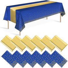 blue and gold table cloths with polka dots on them