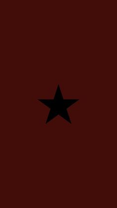 a black star on a red background