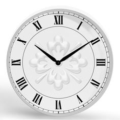 a white clock with roman numerals on the face