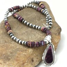 Women's Gift Navajo Sterling Silver Purple Spiny Necklace 22” Pendant 4736 Rare This Native American Navajo Purple Spiny Oyster Necklace And Matching Pendant Has A Beautiful Matrix, With A Strand Of Silver Beads Add This Signed Pendant Necklace A Class Of Its Own. Free Gift Velvet With Purchase. Jewelry Type: Necklaces Length: 22 Pendant: 1.75” With Bail Artisan: N J Material: Stone Metal: Sterling Silver Made In Usa Purple Necklaces, Oyster Necklace, Necklaces Length, Necklaces Pendant, Purple Necklace, Spiny Oyster, A Class, Silver Beads, Free Gift