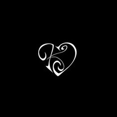 the letter k is made up of hearts and swirls in white on black background