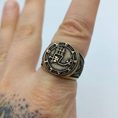 Dantalion demon sigil occult ring Dantalion is a demon of Goetia, he reveals the secret intentions of anyone; he knows the thoughts of all men and women, and he can change them at will. The ring is made with Dantalion magic sigil in center. The ring will fit for men and women who likes mystic, occult, satanic, witchcraft or gothic jewelry. The demon ring can be a gift as goth or witch ring. Description of Dantalion bronze ring: Material: Italian bronze solid (88 % Copper, 12% Tin) The ring is ma Symbolic Bronze Metal Ring Jewelry, Symbolic Bronze Jewelry With Metal Ring, Symbolic Bronze Metal Rings, Symbolic Metal Signet Ring As Gift, Dantalion Demon, Demon Ring, Satanic Witchcraft, Witch Ring, Greek Mythology Jewelry