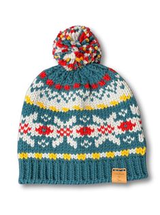 a blue and yellow knitted hat with a pom - pom on top