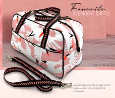 a pink and white floral duffel bag on a black leash with the words favorite overnight duffle written below it