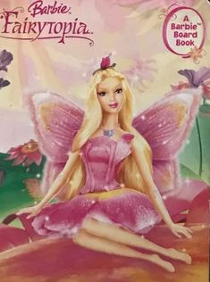 the barbie fairy book is open to show its beautiful pink dress