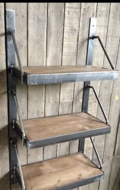 three tiered metal shelf with wood shelves