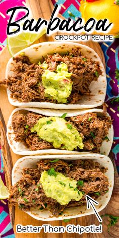 three shredded beef tacos with guacamole and limes on the side