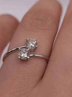 "This is a beautiful 2 stone Lab Grown diamond ring. It is set in real solid 14Kt Gold. You can choose if you want 14Kt White Gold, 14Kt Yellow Gold or 14Kt Rose Gold.  We have a lot of beautiful jewelry with natural diamonds. If any listing states \"diamond\" then it is a natural diamond. If the listing states \"Lab Grown\" it is a Lab Grown diamond. This is the perfect gift for mom, wife, fiancee, girlfriend, valentine, daughter, family or friend. It is a special gift for mother's day, valentine's day, wedding, anniversary, birthday, Christmas, Easter, New Year's and any holiday. Total Ct Weight: 0.60 Carats Clarity: VS-SI Color: FG  Metal Weight: 1.30 Grams 1.25mm ring width Comes in jewelry box MATCHING NECKLACE, EARRINGS & BRACELET AVAILABLE  CHECK OUT OUR BEAUTIFUL SELECTION OF JEWEL Solitaire Bypass Ring With Round Cut For Anniversary, Diamond White Brilliant Cut Bypass Ring For Gift, Diamond Bypass Ring With Vs Clarity As Gift, Anniversary Solitaire Bypass Ring, Anniversary Bypass Ring With Brilliant Cut, Diamond White Bypass Ring With Vvs Clarity For Promise, Solitaire Bypass Ring For Anniversary, Vvs Clarity Round Cut Bypass Promise Ring, Anniversary Fine Jewelry Bypass Ring With Brilliant Cut