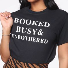 Booked, Busy & Unbothered Design T-Shirt. Custom Made And Made To Order Designs. Short Sleeves. Crew Neck. Unisex Sizing. For Oversized Look, Order One Size Up. Ring Spun 100% Cotton. High Quality Shirt And Vinyl. Sizes Xs-3x Available. Fast Shipping. Perfect For Us Poshers And Small Business Owners. Black Bookish Tops With Text Print, Black Bookish Top With Text Print, Black Bookish Top With Letter Print, Black Letter Print Top For Bookish Style, Sheer White Shirt, Clothing Brand Ideas, Lactation Consultant, Cute Shirt Designs, Front Tie Shirt