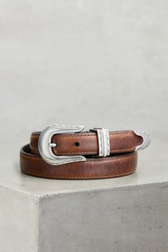 With gentle western detailing and rich natural undertones, the Magnolia belt lends a uniquely graceful ruggedness to your favorite jeans or slacks. Western Leather Belt, Military Belt, Engraved Metal, American Spirit, Western Leather, Metal Accents, Work Outfits Women