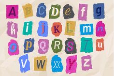 the colorful letters and numbers are drawn with colored crayon paint on white paper