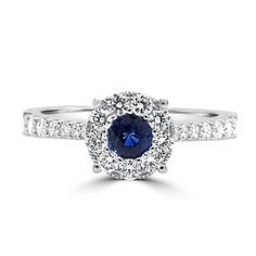 a diamond and blue sapphire engagement ring