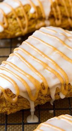 some kind of pastry with icing on top of the cooling rack in front of it