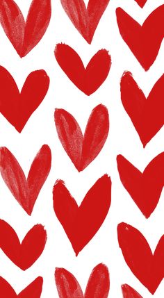 red hearts drawn on white paper in the shape of heart shapes with different sizes and colors