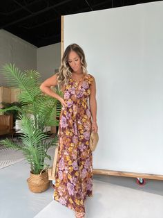 Details Deep V-Neckline Floral Maxi Dress with Chest Strings and Open Side Detailing Lined Color: Brown Multi Material: 100% Polyester Size Runs True to Size Model is Wearing a Size Small Model Measurements Size: 4 Height: 5'2" Weight: 135lbs Bust: 35" Waist: 26" Hips: 35" Bra Size: 34C Brown Floral Print V-neck Dress, Brown V-neck Summer Maxi Dress, Summer Brown V-neck Maxi Dress, Sleeveless Printed Brown Maxi Dress, Brown Sleeveless Printed Maxi Dress, Brown Floral Print Sleeveless Maxi Dress, Sleeveless Brown Floral Print Maxi Dress, Sleeveless Brown Floral Maxi Dress, Brown Floral Print V-neck Maxi Dress