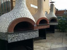 three stone ovens sitting on top of each other