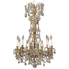 an antique chandelier with crystal drops