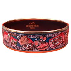 Lovely Authentic Hermès Bracelet Pattern: "Kimonos et Inros" Made in Austria Made of Printed Enamel and Gold Plated Hardware Colorways: Bleu Canard, Rose Saumon, Doré (Teal Blue, Salmon Pink, Golden) Pretty golden details bringing light to the bracelet in the sun Size: 65 Measurements: - 6,5 cm Diameter (2,56 inches) - 1,8 cm Width (0,71 inch) Condition: Very Good. 2 tiny tiny chips on enamel. Micro scratches on hardware. Can be worn as it, not seen at wrist. No Hermès packaging but will come gi Blue Hermes Bracelet, Fashion Boards, Hermes Bracelet, Vintage Hermes, Salmon Pink, Bracelet Patterns, Kimonos, Teal Blue, Arm Band