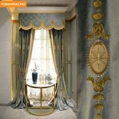 an ornately decorated room with gold trimmings and blue drapes on the windowsill