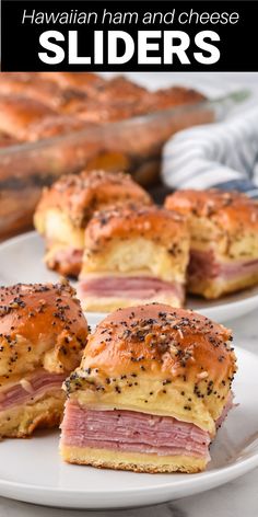 ham and cheese sliders on a white plate