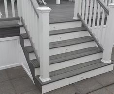 the stairs are painted gray and white