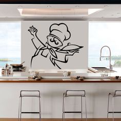 a kitchen wall with a cartoon character on it