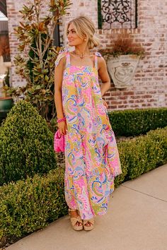 - Get a resort ready look with this vibrant maxi! - Colorful material with a paisley print - A built-in partial lining ending above the knee - A square cut neckline - 1.5 inch tie closure straps - A smocked upper back - Hidden side pockets - A flowy silhouette that ends in a rifle maxi length hemline Paisley Maxi Dress, Square Cut, Above The Knee, Paisley Print, Paisley, Maxi Dress, Luxury Fashion, Fashion Trends, Pink