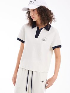 Details: Classic White Colour Block Polo TopSmall silhouetteA small amount of navy clash of colours, adding rich texture.Thick print on the chest for a sophisticated detail. Materials & Care: Cotton 55.5%Lycra 26.2 %Polyester 18.3% Hand wash | Dry clean Do not bleach Size & Fit: Model is 5'7", Bust 32, Waist 24, Hips 35, wearing a size S Item #: SN2TE30 Navy Ribbed Collar Top For Work, Navy Tops With Ribbed Collar For Work, Navy Top With Contrast Collar For Workwear, Navy Cotton Tops With Contrast Collar, Casual Navy Top With Contrast Collar, Petite Silhouette, Chic Business Casual, Denim Jean Dress, Polo Top