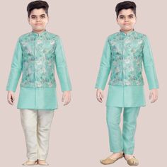 ABOUT THIS ITEM Fabric Details: This is an exclusive Bollywood style party wear Kurta , Jacket and Pajama set made from Soft Silk. Age Group: 1 - 12 years. For best fitting, please take measurements for your child and refer to the size chart in the last picture before purchase. Wash care Instructions: Do not bleach, Iron at low heat, and Dry Clean ( preferred for first wash). Occasion: Birthday gift, Festive wear, Kids Diwali wear, Party and Casual wear, wedding, and all special occasions. Package Includes: 1 Kurta +1 Pajama+1 white Kurta+ 1 Jacket This designer wear features excellent craftsmanship with a mandarin collar and full sleeves set. The set includes the Kurta, Jacket  and Pajama. The soft silk material is skin-friendly and comfortable to wear for little kids. This set is availab Blue Sherwani For Festive Spring Occasions, Blue Sherwani For Spring Festive Occasions, Blue Sherwani For Spring Festivities, Green Sherwani For Festive Spring Occasion, Green Nehru Jacket For Diwali Festivities, Traditional Blue Sherwani For Spring, Blue Traditional Sherwani For Spring, Spring Blue Traditional Sherwani, Turquoise Fitted Long Sleeve Sets