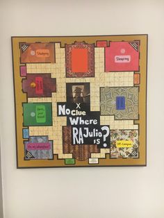 a board game is displayed on the wall