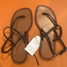 New With Tags Zara Leather Sandals Size 7.5 Usa/38 European Chic Brown T-strap Sandals For Vacation, Casual Brown Leather Lace-up Sandals, Brown Leather Lace-up Sandals With Leather Footbed, Brown Leather Ankle Strap Lace-up Sandals, Brown Leather Lace-up Sandals For Beach, Chic Brown Lace-up Beach Sandals, Chic Brown Toe Post Sandals, Chic Brown Lace-up Sandals For Beach, Chic Brown Flat T-strap Sandals