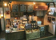 an old fashioned bakery with lots of items on display