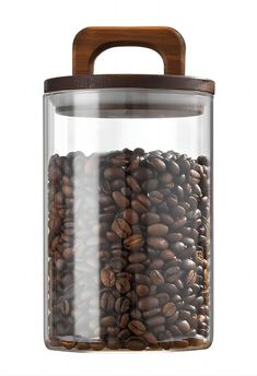 a glass jar filled with coffee beans