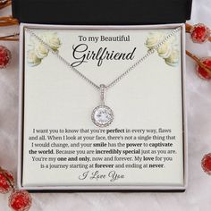 a gift box with a necklace that says to my beautiful girlfriend