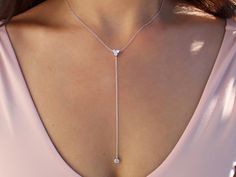 This gorgeous Multi Stone Lariat Necklace is available in 18k gold vermeil and sterling silver. The necklace can be worn on it's own or can easily be layered with other chokers and necklaces. Wear this to any occasion and be ready to shine! This item is also referred to as Y Necklace. MEASUREMENTS The length of the Multi Stone Lariat Necklace is 16 inches around the neck with a 3.5 inch drop and a cubic zirconia charm. Each necklace comes with an additional 2.5-inch extender chain to easily adju Cheap Trendy Formal Necklaces, Cheap Long Party Necklaces, Cheap Long Necklace Perfect For Gifts, Affordable Elegant Necklace With Adjustable Length, Cheap Metal Lariat Necklace For Party, Elegant Cheap Dangle Necklaces, Cheap Elegant Necklaces With Adjustable Chain, Cheap Minimalist Long Necklace, Cheap Formal Single Strand Necklaces